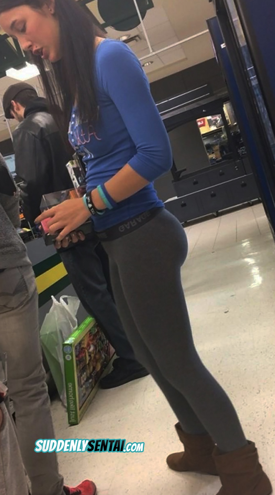 Perky ass of beautiful tall girl in the store - The Voyeur 